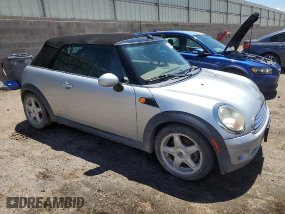 2010 MINI Convertible with VIN WMWMR3C5XATU98379, listed as a Copart auction lot 56360255 with 108,414 mi miles and Clean Title. Bid and sale history available at DreamBid. Image 4.