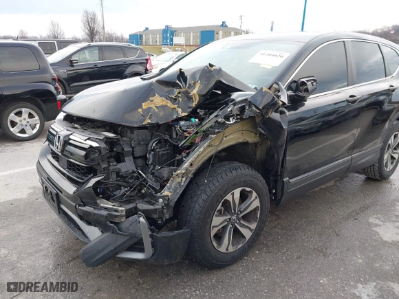 2020 Honda CR-V LX with VIN 2HKRW2H2XLH671349, listed as a IAAI auction lot 41204020 with 71,374 mi miles. Bid and sale history available at carsss.com. Image 6.