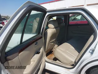 2006 Cadillac DTS w/1SC with VIN 1G6KD57Y56U132648, listed as a IAAI auction lot 41862030 with 128,003 mi miles. Bid and sale history available at carsss.com. Image 8.