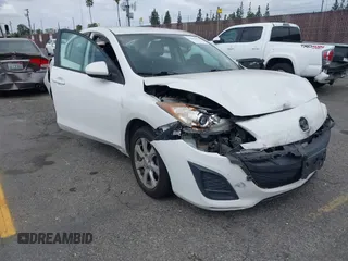2011 Mazda 3 i Touring with VIN JM1BL1VF1B1402934, listed as a IAAI auction lot 42085662 with 162,473 mi miles and . Bid and sale history available at DreamBid. Image 1.