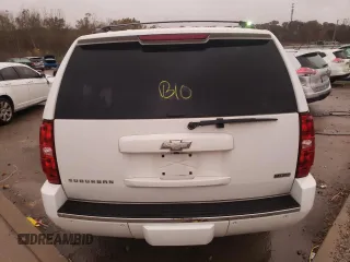 2009 Chevrolet Suburban LTZ with VIN 1GNFC36019J122990, listed as a Copart auction lot 79067174 with 167,632 mi miles and Salvage title. Bid and sale history available at DreamBid. Image 6.