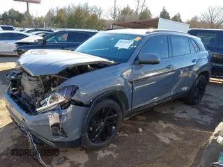 2021 Volkswagen Atlas SEL Premium with VIN 1V2TE2CAXMC215550, listed as a IAAI auction lot 41579665 with 55,264 mi miles and . Bid and sale history available at DreamBid. Image 2.