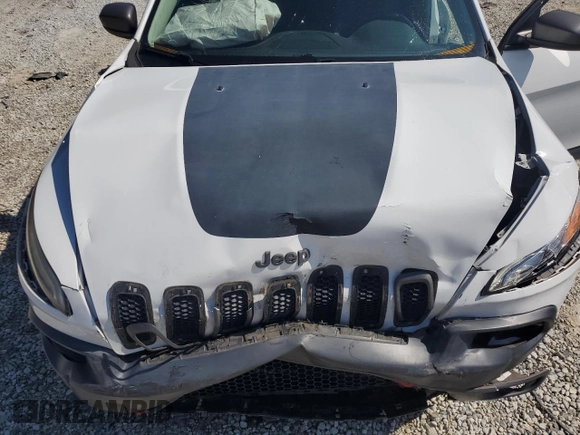 2015 Jeep Cherokee Trailhawk with VIN 1C4PJMBS0FW705288, listed as a Copart auction lot 61796275 with 133,874 mi miles and Salvage title. Bid and sale history available at DreamBid. Image 12.