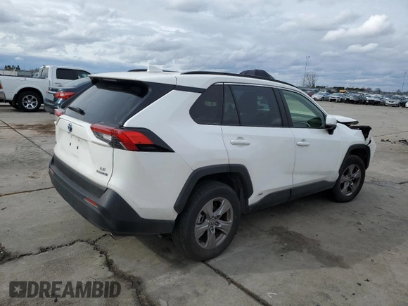2023 Toyota RAV4 Hybrid LE with VIN JTMMWRFV3PD570648, listed as a Copart auction lot 86983174 with 27,258 mi miles and Salvage title. Bid and sale history available at DreamBid. Image 3.