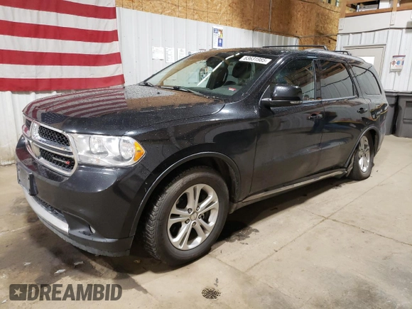 2012 Dodge Durango Crew with VIN 1C4SDJDT0CC323006, listed as a Copart auction lot 63631985 with 126,521 mi miles and Salvage title. Bid and sale history available at DreamBid. Image 1.