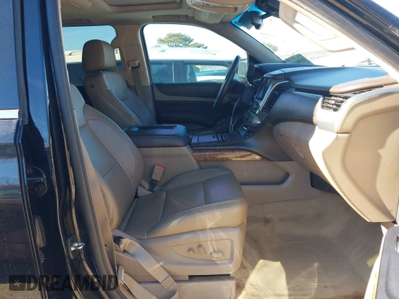 2015 Chevrolet Suburban LTZ with VIN 1GNSCKKC3FR249956, listed as a IAAI auction lot 41306605 with 122,942 mi miles and . Bid and sale history available at DreamBid. Image 5.