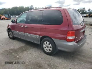 2005 Kia Sedona LX with VIN KNDUP131056614364, listed as a Copart auction lot 73935454 with 149,420 mi miles and Salvage Title. Bid and sale history available at carsss.com. Image 2.