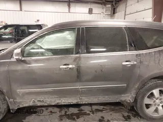 2015 Chevrolet Traverse LTZ with VIN 1GNKVJKD8FJ360899, listed as a IAAI auction lot 41634924 with 165,835 mi miles and . Bid and sale history available at DreamBid. Image 14.