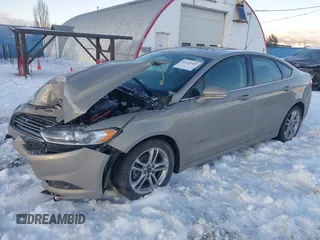 2016 Ford Fusion SE Hybrid with VIN 3FA6P0LU8GR127311, listed as a IAAI auction lot 41242945 with 1 mi miles. Bid and sale history available at carsss.com. Image 2.