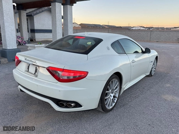 2012 Maserati GranTurismo S with VIN ZAM45KLA1C0061862, listed as a Copart auction lot 87091844 with 31,825 mi miles and Clean Title. Bid and sale history available at carsss.com. Image 4.