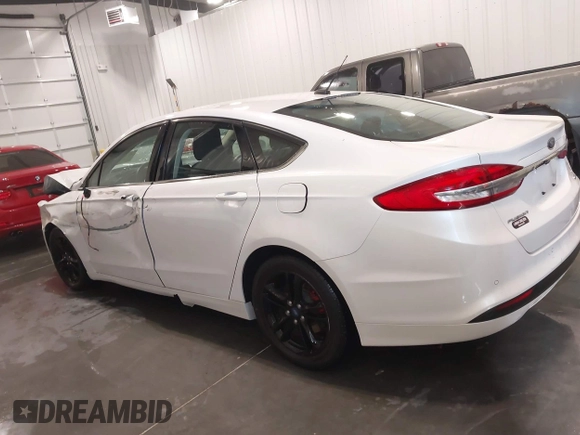 2018 Ford Fusion SE z VIN 3FA6P0HD9JR231970, wystawiony jako IAAI lot #41549490 z przebiegiem 99 803 mil mil oraz . Historia ofert i sprzedaży dostępna na DreamBid. Obrazek 14.