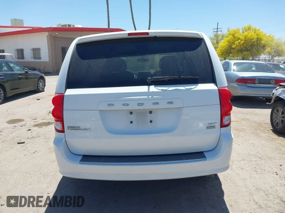 2014 Dodge Grand Caravan SXT with VIN 2C4RDGCG1ER429495, listed as a IAAI auction lot 42058513 with 136,936 mi miles and . Bid and sale history available at DreamBid. Image 16.