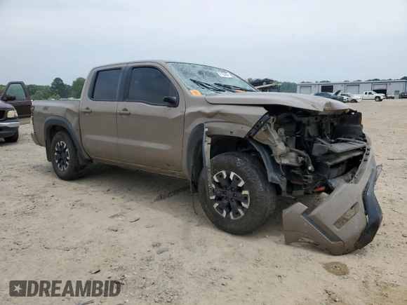 2023 Nissan Frontier Pro-4X with VIN 1N6ED1EK0PN617872, listed as a Copart auction lot 57125435 with 97,981 mi miles and Salvage title. Bid and sale history available at DreamBid. Image 4.