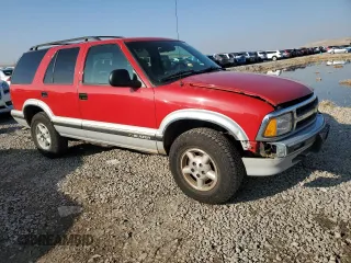 1995 Chevrolet Blazer z VIN 1GNDT13W4S2243226, wystawiony jako Copart lot #81429904 z przebiegiem 1 757 497 mil mil oraz Szkoda całkowita • Salvage title. Historia ofert i sprzedaży dostępna na DreamBid. Obrazek 4.