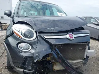 2014 FIAT 500L Trekking z VIN ZFBCFADH8EZ008208, wystawiony jako IAAI lot #42091284 z przebiegiem 79 407 mil mil oraz . Historia ofert i sprzedaży dostępna na DreamBid. Obrazek 18.