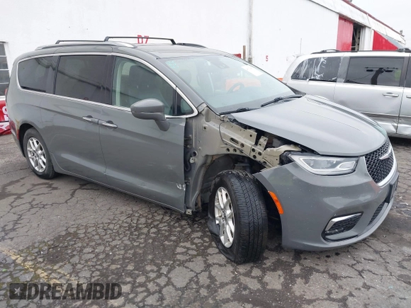 2021 Chrysler Pacifica Touring L with VIN 2C4RC1BG0MR543634, listed as a IAAI auction lot 41513467 with 148,010 mi miles and . Bid and sale history available at DreamBid. Image 1.