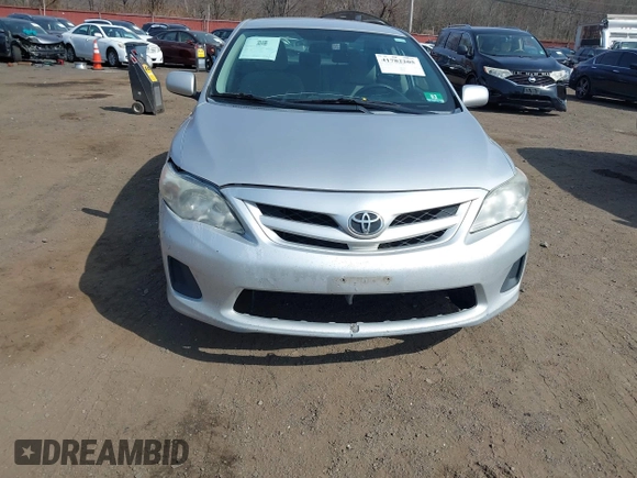 2012 Toyota Corolla L with VIN 2T1BU4EE7CC842871, listed as a IAAI auction lot 41782205 with 213,186 mi miles. Bid and sale history available at carsss.com. Image 6.