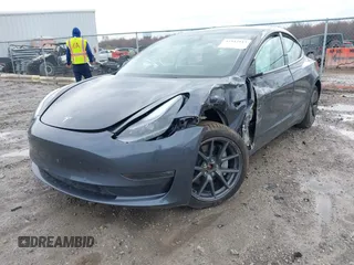 2022 Tesla Model 3 Long Range with VIN 5YJ3E1EB8NF201023, listed as a IAAI auction lot 41942943 with 30,635 mi miles and . Bid and sale history available at DreamBid. Image 16.