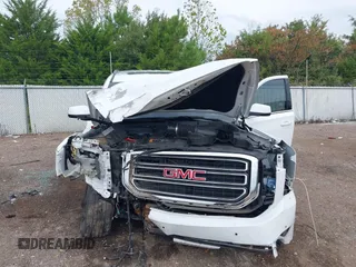 2019 GMC Yukon XL SLT with VIN 1GKS2GKC2KR369285, listed as a IAAI auction lot 40279008 with Not Provided miles and . Bid and sale history available at DreamBid. Image 6.