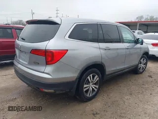 2018 Honda Pilot EX-L with VIN 5FNYF5H54JB006773, listed as a IAAI auction lot 41534534 with 131,570 mi miles. Bid and sale history available at carsss.com. Image 4.