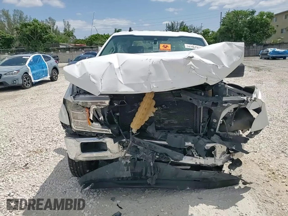 2019 Ford F-150 XL with VIN 1FTEW1C44KFA19563, listed as a Copart auction lot 52402655 with 147,071 mi miles and Non Repairable. Bid and sale history available at DreamBid. Image 13.