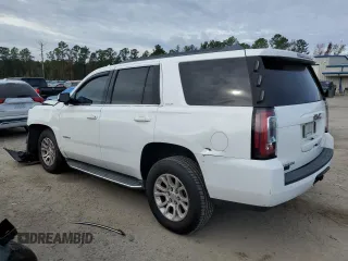 2015 GMC Yukon SLE with VIN 1GKS2AKCXFR744083, listed as a Copart auction lot 82003234 with 150,926 mi miles and Salvage Title. Bid and sale history available at carsss.com. Image 2.