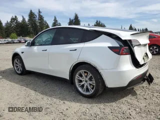 2020 Tesla Model Y Long Range with VIN 5YJYGDEF2LF006357, listed as a Copart auction lot 54888215 with 55,983 mi miles and Salvage Title. Bid and sale history available at DreamBid. Image 2.