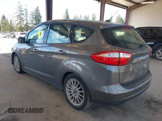 2013 Ford C-Max SE z VIN 1FADP5AU4DL556432, wystawiony jako IAAI lot #41703080 z przebiegiem 147 693 mil mil oraz . Historia ofert i sprzedaży dostępna na DreamBid. Obrazek 3.