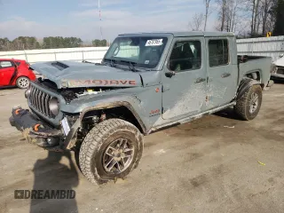 2024 Jeep Gladiator Mojave X z VIN 1C6JJTEG5RL115608, wystawiony jako Copart lot #46787955 z przebiegiem 7 283 mil mil oraz Szkoda całkowita • Salvage title. Historia ofert i sprzedaży dostępna na DreamBid. Obrazek 1.