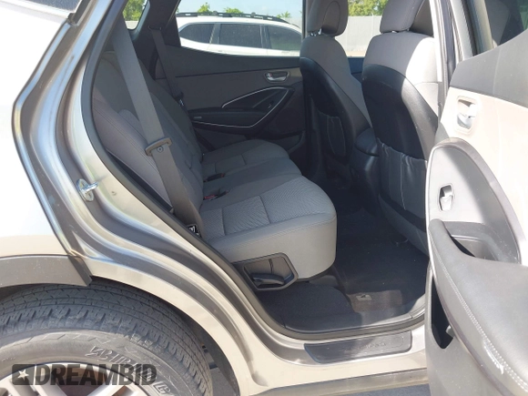 2017 Hyundai Santa Fe 2.4L z VIN 5XYZTDLB7HG444033, wystawiony jako IAAI lot #42263907 z przebiegiem 107 454 mil mil oraz . Historia ofert i sprzedaży dostępna na DreamBid. Obrazek 8.