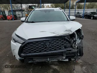 2023 Toyota Corolla Cross LE z VIN 7MUBAAAG5PV037601, wystawiony jako Copart lot #49168915 z przebiegiem 24 175 mil mil oraz Szkoda całkowita • Salvage title. Historia ofert i sprzedaży dostępna na DreamBid. Obrazek 5.