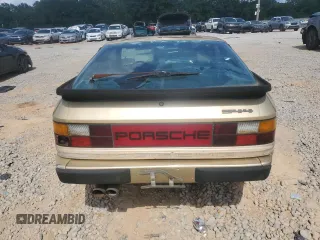 1984 Porsche 944 z VIN WP0AA0940EN458560, wystawiony jako Copart lot #59191935 z przebiegiem 85 420 mil mil oraz Czysty tytuł • Clean title. Historia ofert i sprzedaży dostępna na DreamBid. Obrazek 6.