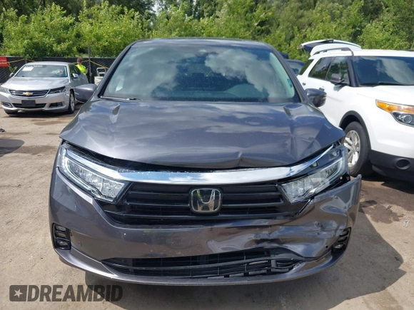 2022 Honda Odyssey Touring with VIN 5FNRL6H89NB008814, listed as a IAAI auction lot 42597738 with 49,933 mi miles and . Bid and sale history available at DreamBid. Image 12.