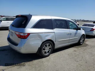 2011 Honda Odyssey EX-L with VIN 5FNRL5H64BB022124, listed as a Copart auction lot 55444745 with 150,843 mi miles and Salvage Title. Bid and sale history available at DreamBid. Image 3.