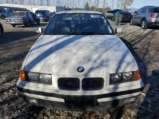 1995 BMW 3 Series 325i with VIN WBACB4326SFM22346, listed as a Copart auction lot 79960304 with 71,071 mi miles and Salvage Title. Bid and sale history available at carsss.com. Image 5.