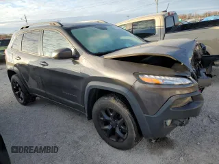 2016 Jeep Cherokee Trailhawk with VIN 1C4PJMBS7GW288639, listed as a Copart auction lot 84059884 with 76,169 mi miles and Non repairable. Bid and sale history available at DreamBid. Image 4.