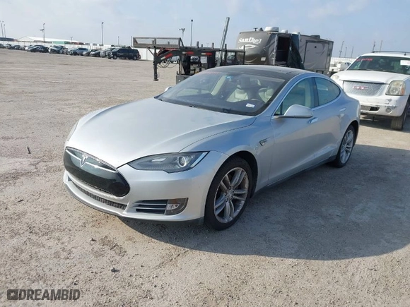 2013 Tesla Model S with VIN 5YJSA1CG3DFP28908, listed as a IAAI auction lot 41804041 with 140,756 mi miles. Bid and sale history available at carsss.com. Image 14.