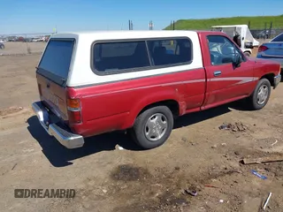 1992 Toyota Pickup DLX z VIN 4TARN81PXNZ030799, wystawiony jako IAAI lot #41879500 z przebiegiem 221 198 mil mil oraz . Historia ofert i sprzedaży dostępna na DreamBid. Obrazek 4.