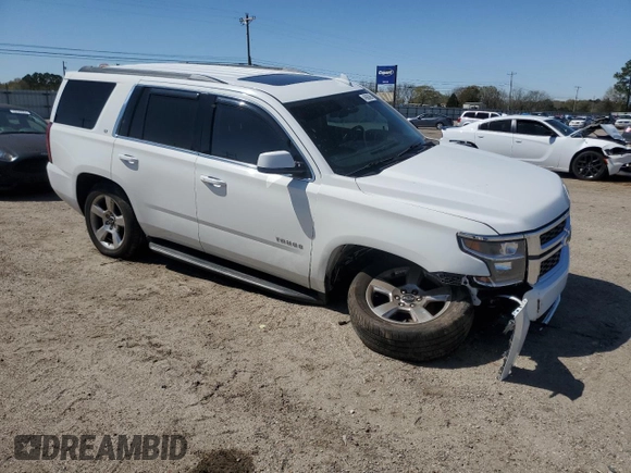 2015 Chevrolet Tahoe LT with VIN 1GNSCBKC1FR661681, listed as a Copart auction lot 49865695 with 191,306 mi miles and Salvage Title. Bid and sale history available at DreamBid. Image 4.