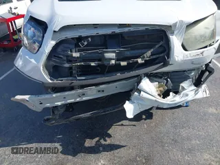 2015 Ford Transit z VIN 1FTNE1CM8FKB16085, wystawiony jako IAAI lot #42438768 z przebiegiem Nie podano mil oraz . Historia ofert i sprzedaży dostępna na DreamBid. Obrazek 6.
