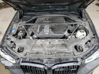 2022 BMW X4 M z VIN 5YM23EC01N9N39875, wystawiony jako Copart lot #66325504 z przebiegiem 35 324 mil mil oraz Szkoda całkowita • Salvage title. Historia ofert i sprzedaży dostępna na DreamBid. Obrazek 12.