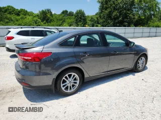 2018 Ford Focus SE with VIN 1FADP3F25JL331038, listed as a Copart auction lot 60235395 with 37,038 mi miles and Salvage title. Bid and sale history available at DreamBid. Image 3.