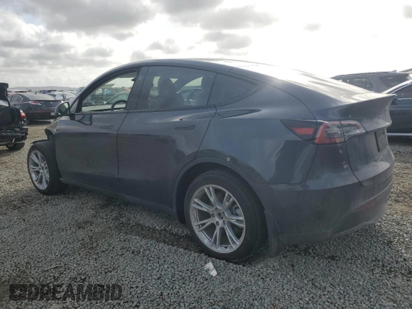 2024 Tesla Model Y с VIN 7SAYGDED9RF092955, выставлен на аукционе Copart как лот 51114245 с пробегом 6 385 миль миль и Списание • Salvage title. История ставок и продаж доступна на DreamBid. Изображение 2.