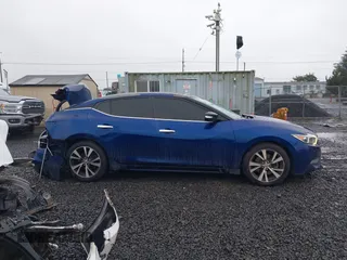 2016 Nissan Maxima SL with VIN 1N4AA6APXGC396890, listed as a IAAI auction lot 41594044 with 144,164 mi miles and . Bid and sale history available at DreamBid. Image 13.