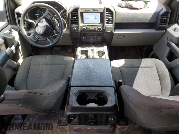 2019 Ford F-150 XL with VIN 1FTEW1E43KKE28982, listed as a Copart auction lot 58302285 with 101,707 mi miles and Salvage title. Bid and sale history available at DreamBid. Image 8.