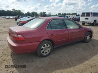 2000 Honda Accord SE with VIN JHMCG5673YC023811, listed as a Copart auction lot 56331885 with 194,416 mi miles and Salvage title. Bid and sale history available at DreamBid. Image 3.