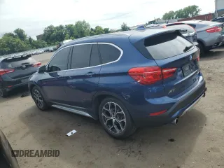 2021 BMW X1 xDrive28i with VIN WBXJG9C0XM5U47141, listed as a Copart auction lot 60645865 with 56,106 mi miles and Salvage title. Bid and sale history available at DreamBid. Image 2.
