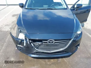 2016 Mazda 3 i Sport z VIN 3MZBM1U77GM305672, wystawiony jako IAAI lot #42237533 z przebiegiem 79 752 mil mil oraz . Historia ofert i sprzedaży dostępna na DreamBid. Obrazek 6.