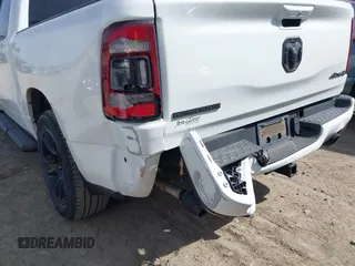 2021 Ram 1500 Big Horn with VIN 1C6SRFFT0MN521027, listed as a IAAI auction lot 41830596 with 55,013 mi miles and . Bid and sale history available at DreamBid. Image 19.
