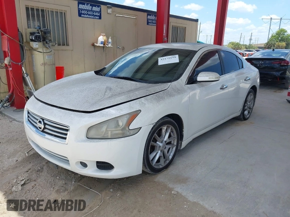 2013 Nissan Maxima SV with VIN 1N4AA5AP8DC814580, listed as a IAAI auction lot 42179159 with 122,758 mi miles and . Bid and sale history available at DreamBid. Image 2.